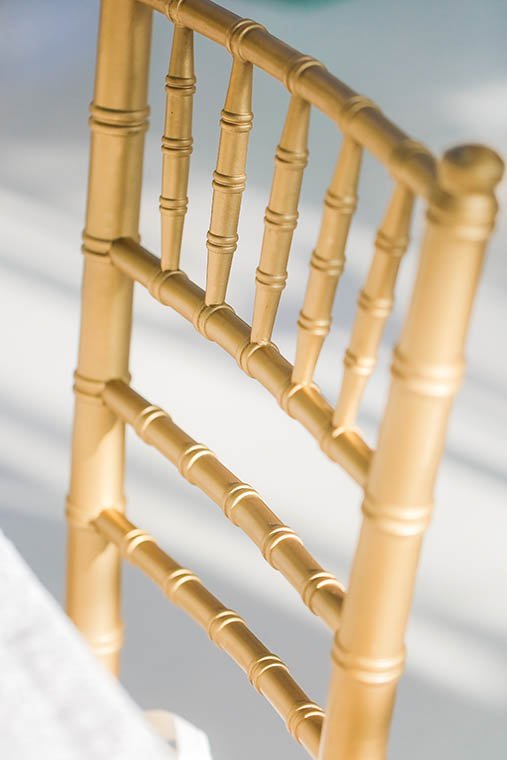 Gold Chiavari chair detail from an Allure styled shoot